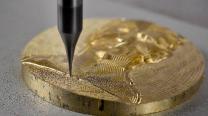 One application of this technology is the creation of relief sculptures on bronze.